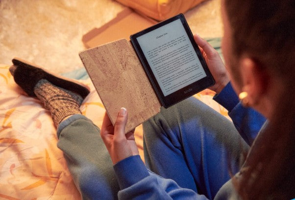 Person reading a self-help ebook on a tablet at home